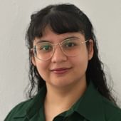 Sahara Villarreal, a white woman with long black hair and glasses.